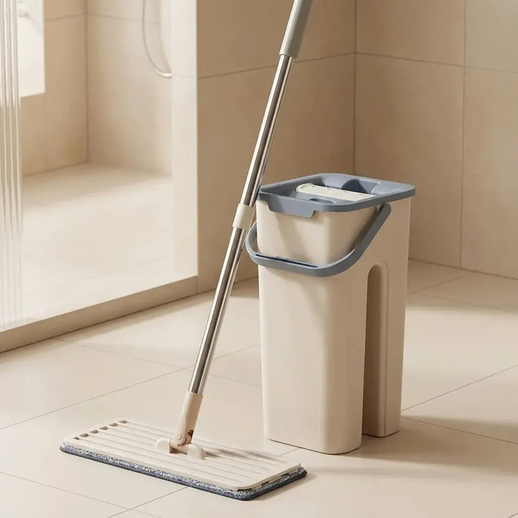Trapero mopa plano con balde, sistema de lavado y escurrido, paño de microfibra y mango de acero inoxidable para facilitar la limpieza del hogar.